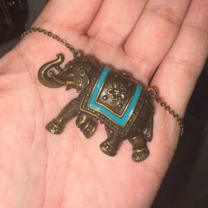 Bronze Elephant Pendant Necklace with Turquoise Accents